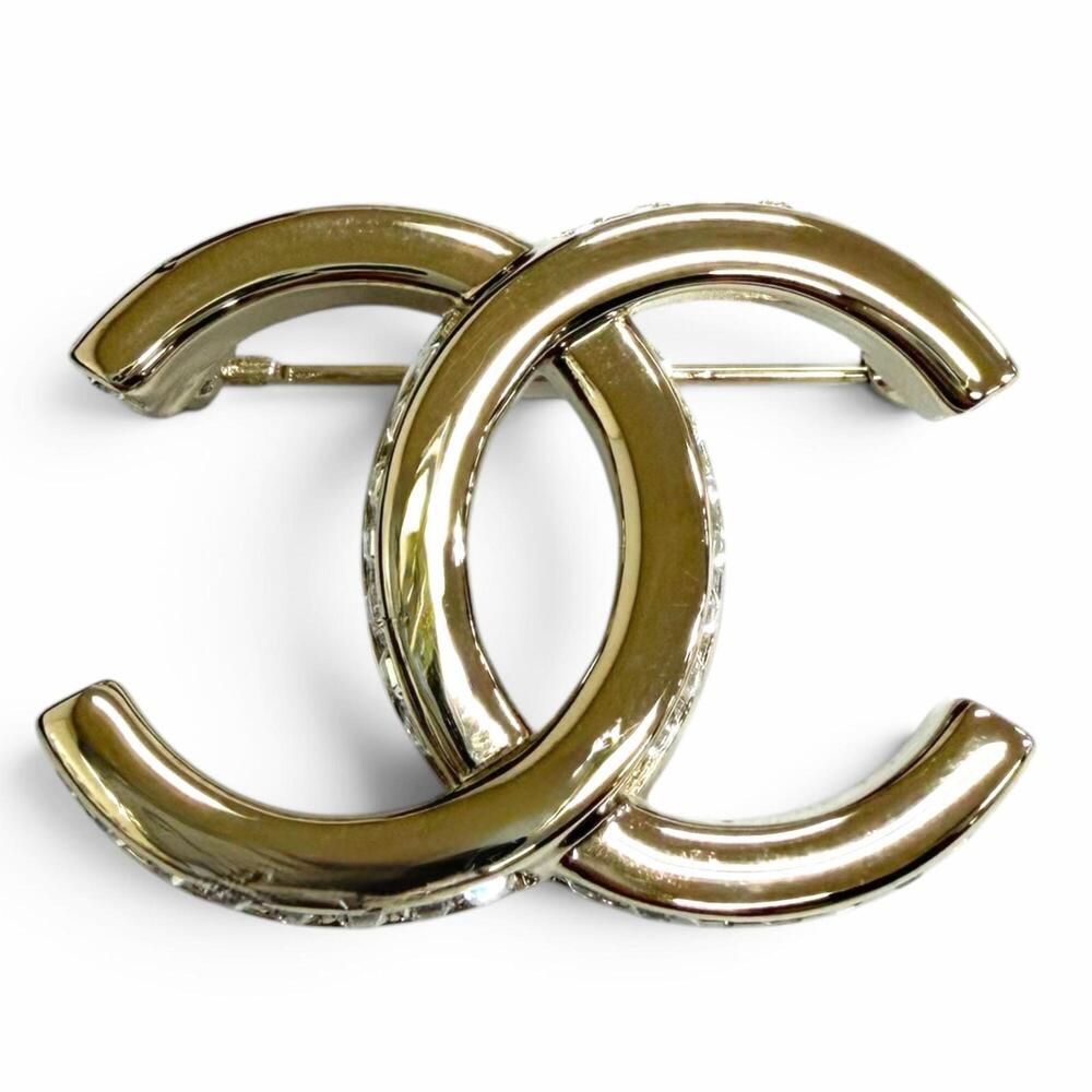 CHANEL Gold Logo Brooch